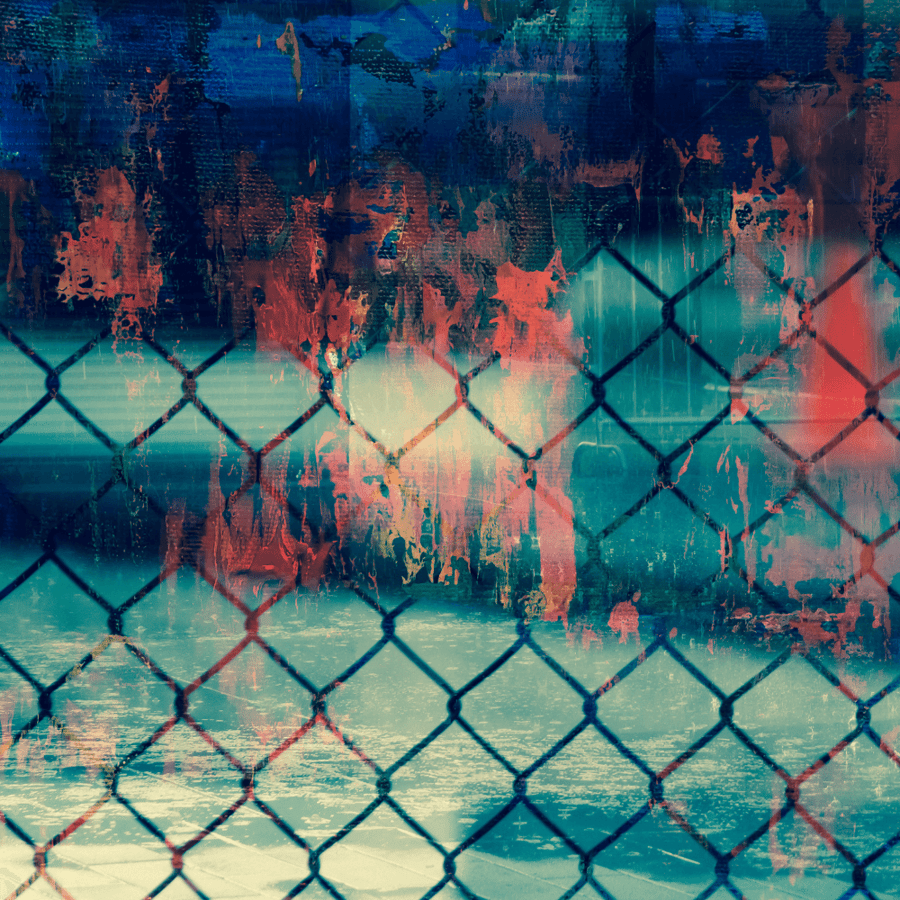 An abstract chain link fence with faces hazily hidden behind in abstract red hues