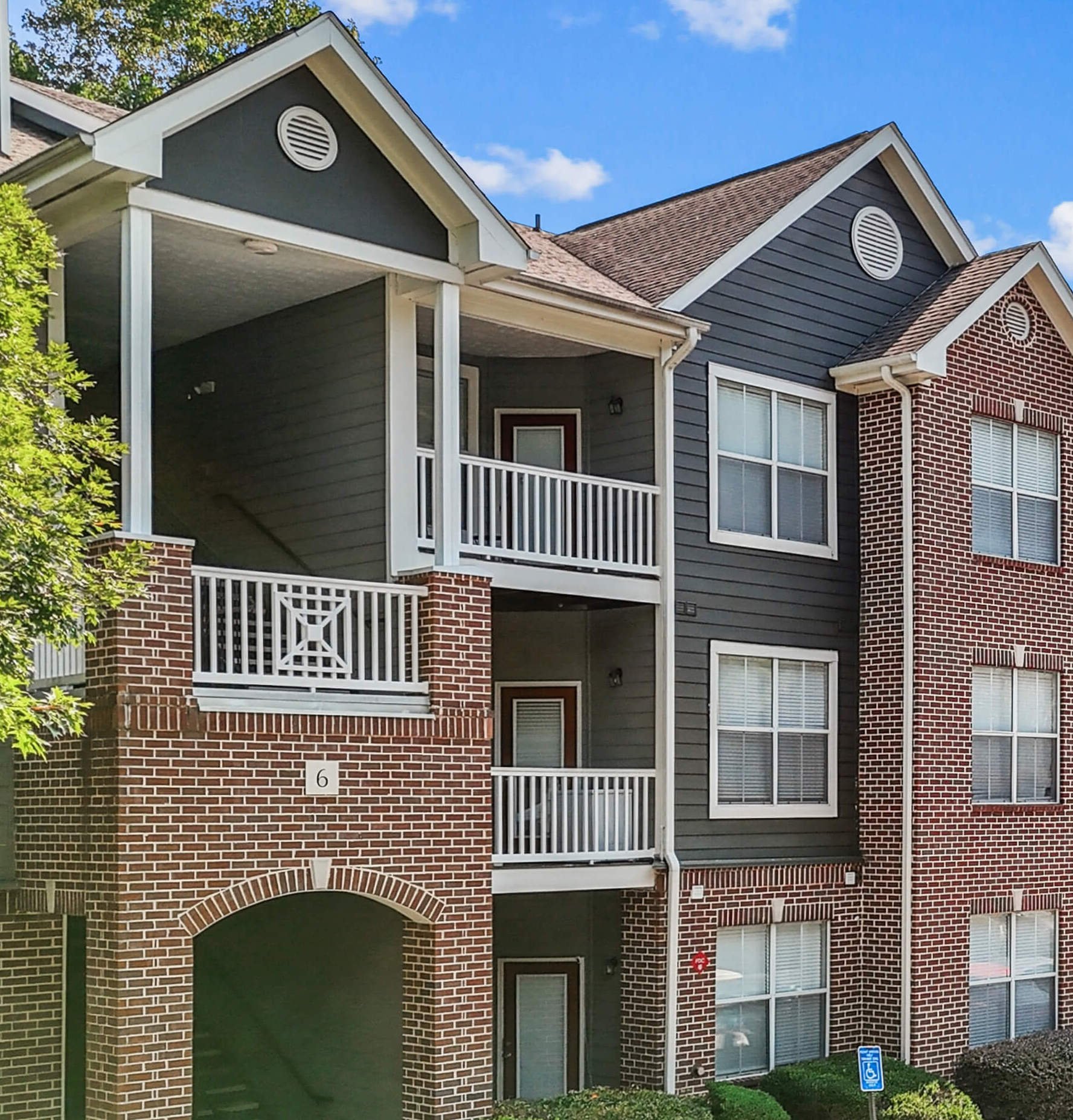 Apartment with trees and railings